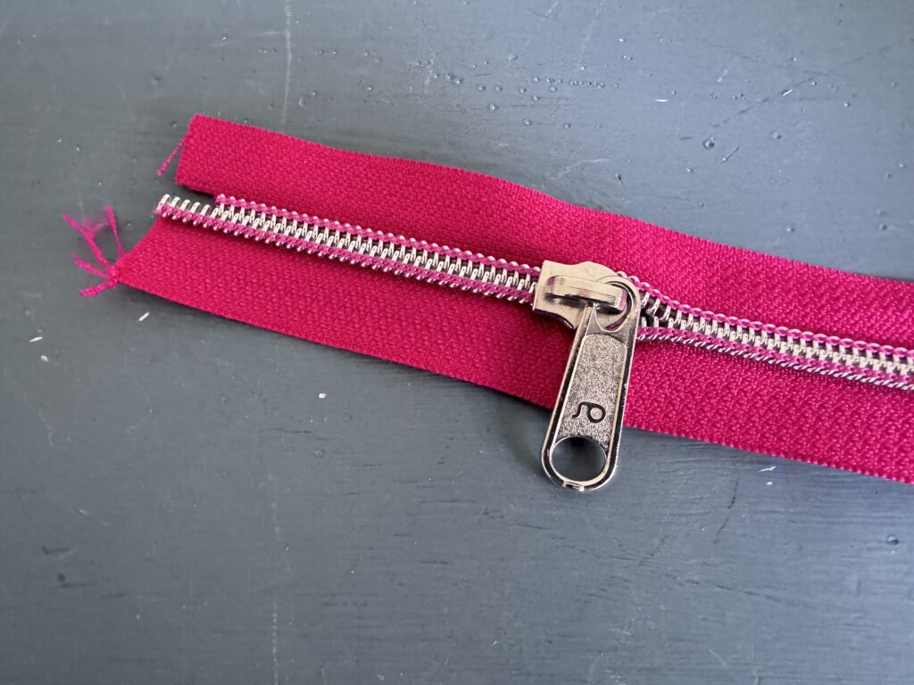 Zipper auffädeln