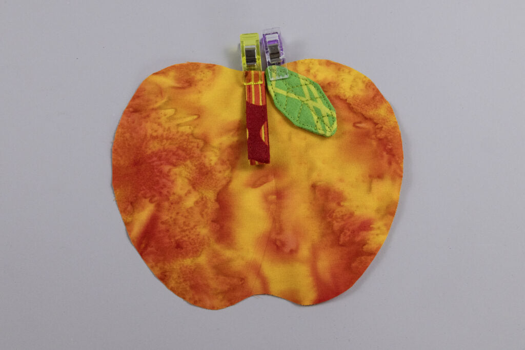 Stiel und Blatt am Rückteil platzieren
