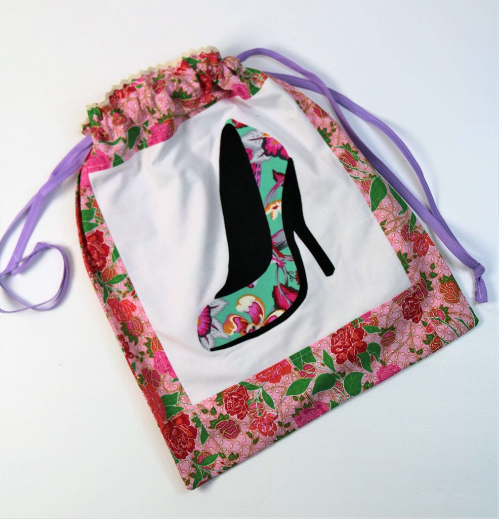 Beutel mit mintfarbenem Schuh